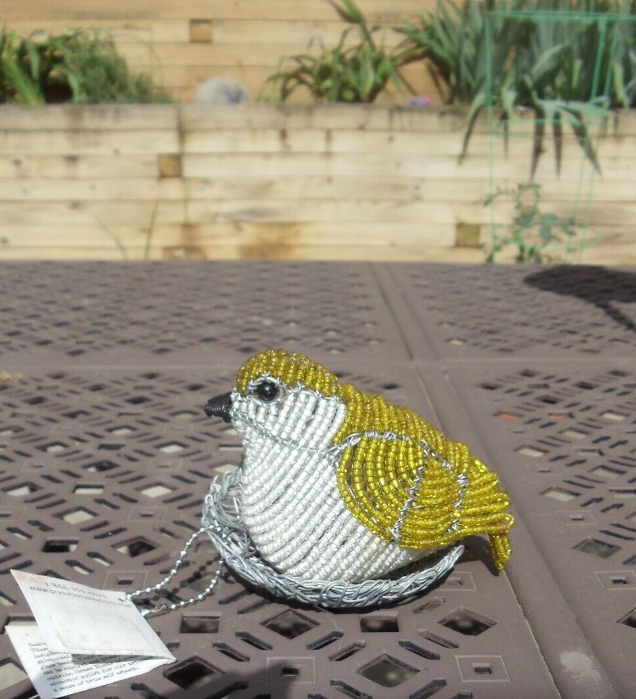 Beaded bird:  Yellow nesting bird