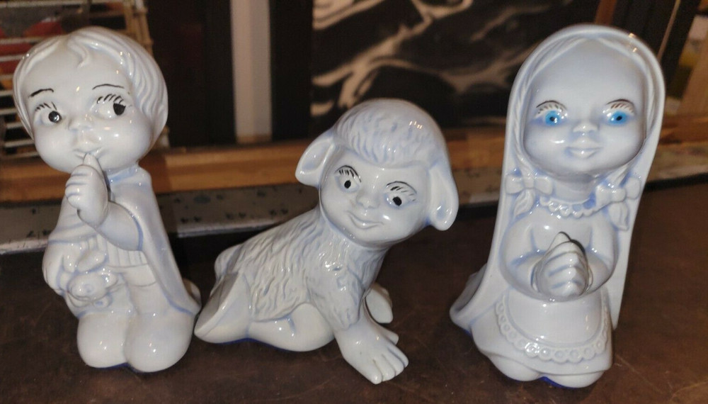 creepy children figurines weird kitsch