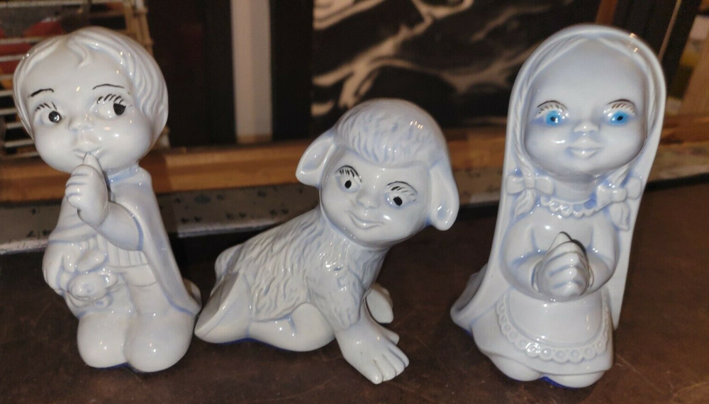 creepy children figurines weird kitsch