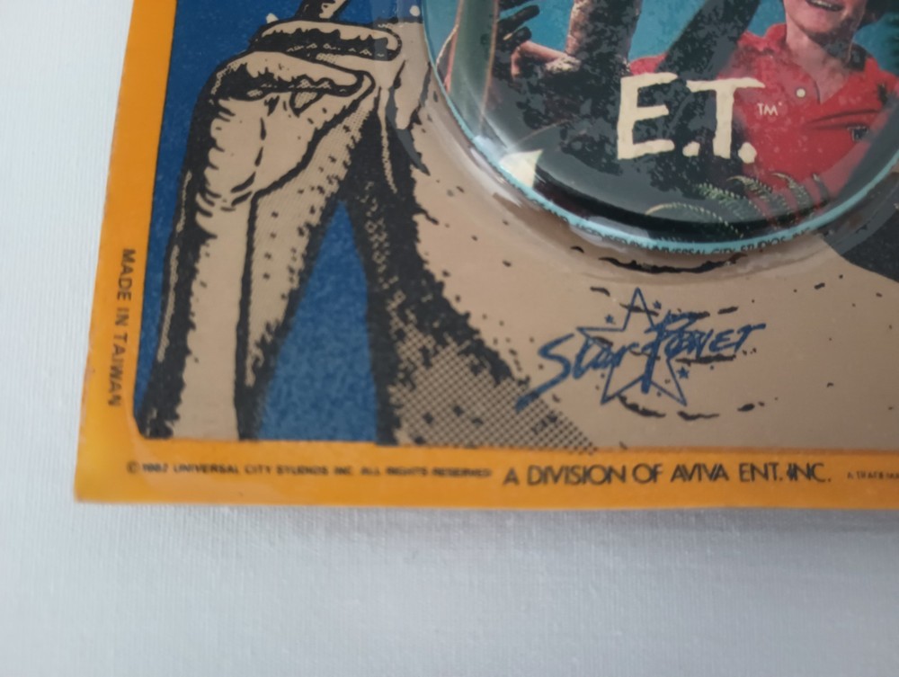 1982 E. T. Photo Button New in Package & Mechanical E.T. Plastic Figure