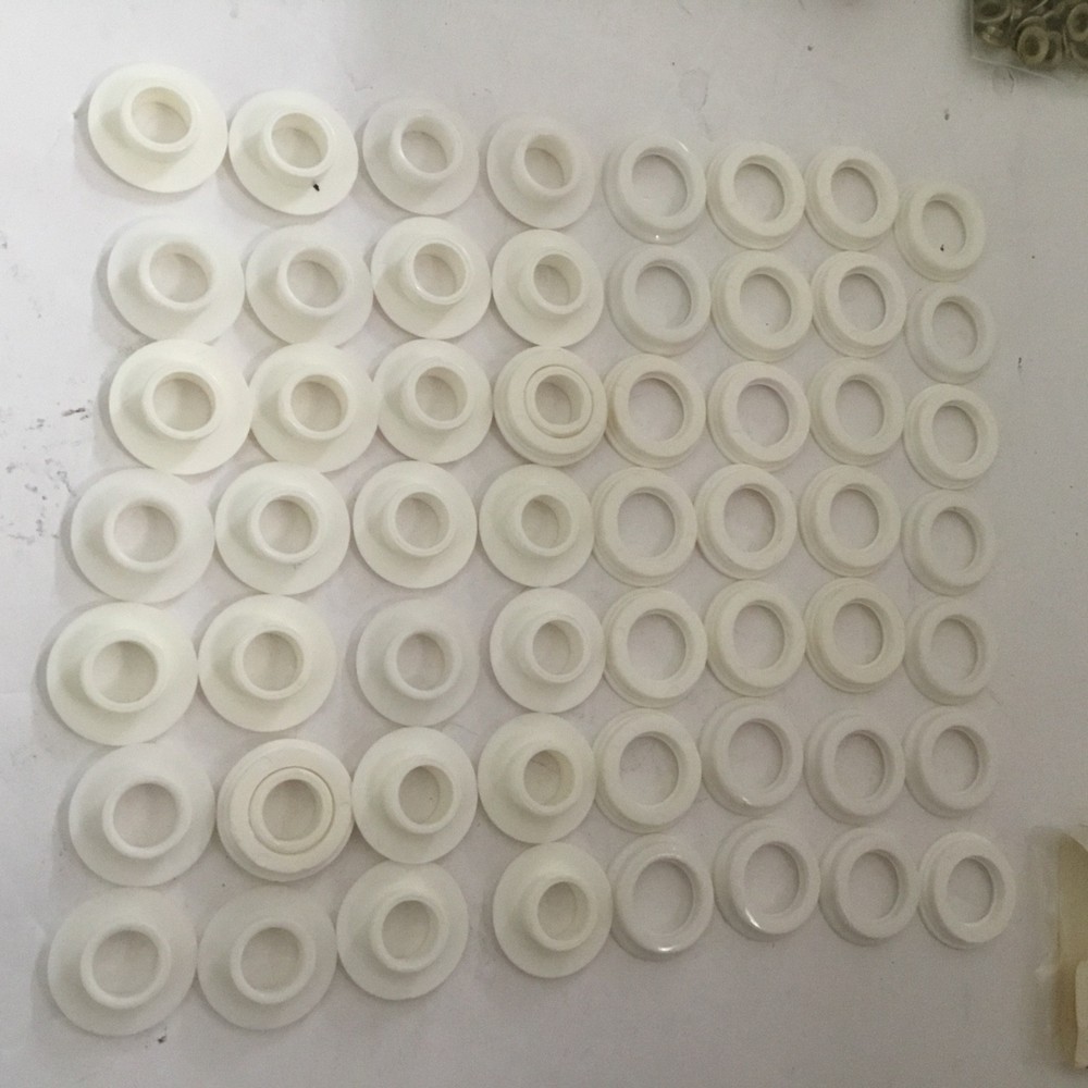 Grommets snaps-on plastic, white. 28 sets. Size 4