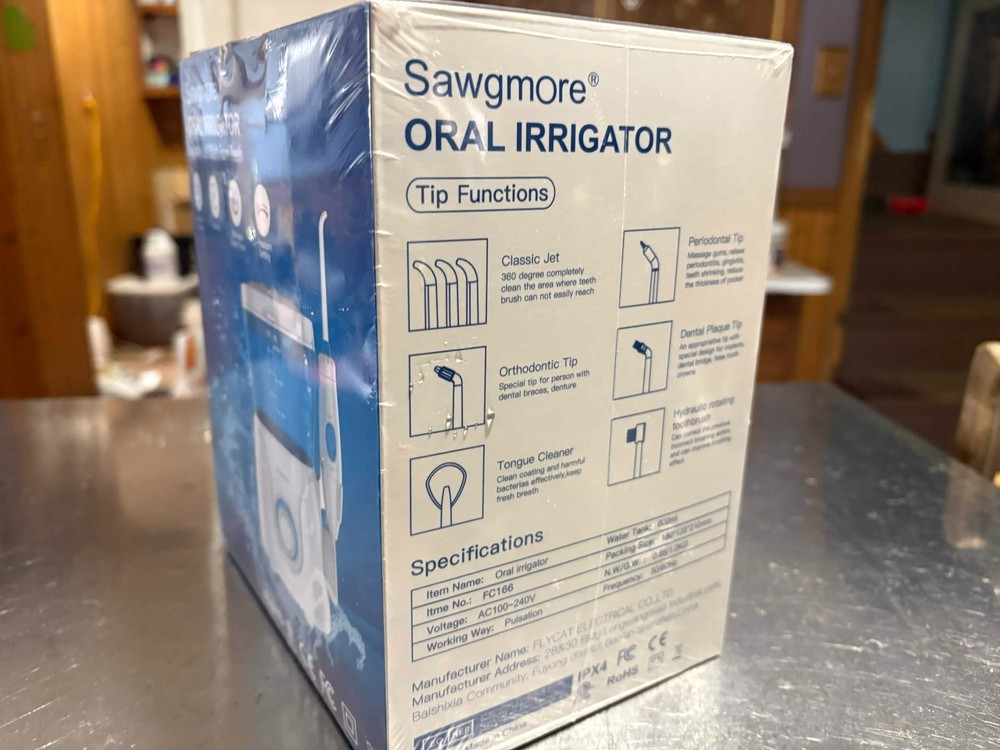 Sawgmore oral irrigator in box