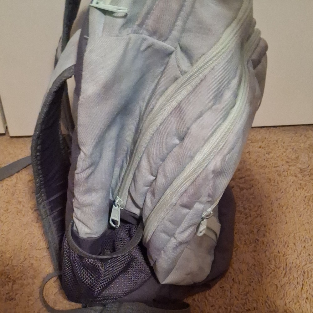 Adidas light blue with pink splash design Backpack 5 Pockets.