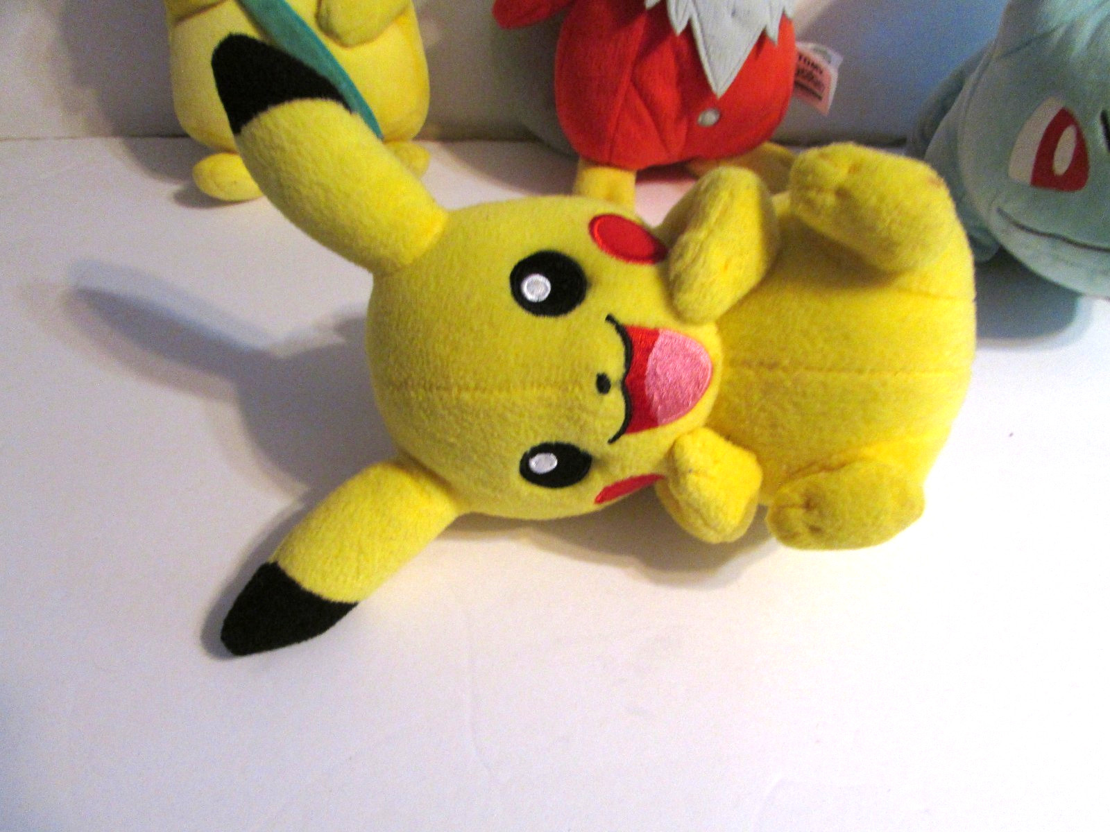 Lot Of 4 Pokemon Plush Pikachu W/Flower Delibird Bulbasaur