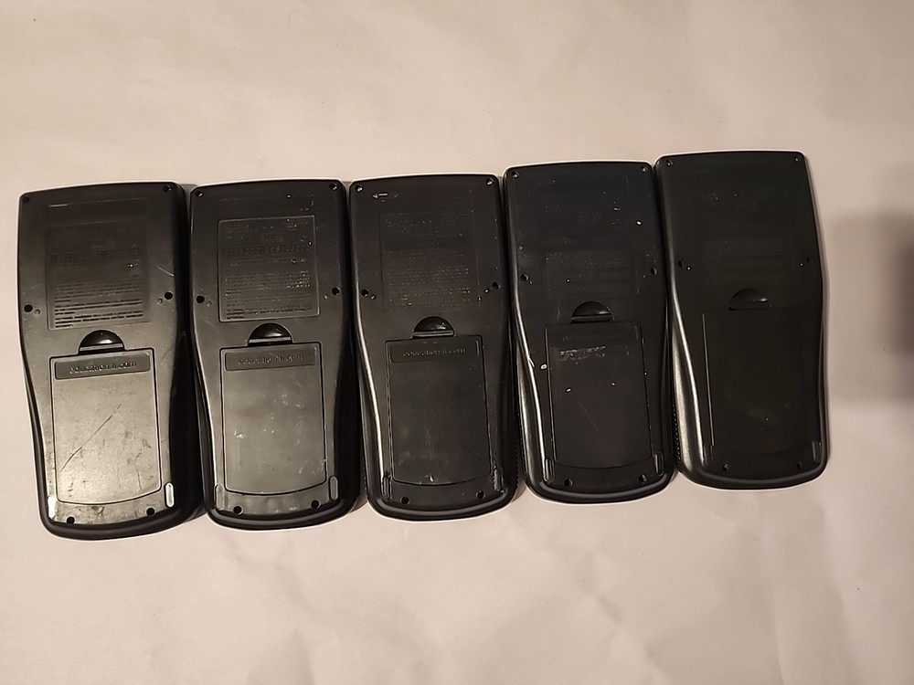 5 - Broken Texas Instruments TI-83 Plus Graphing Calculators - No Covers