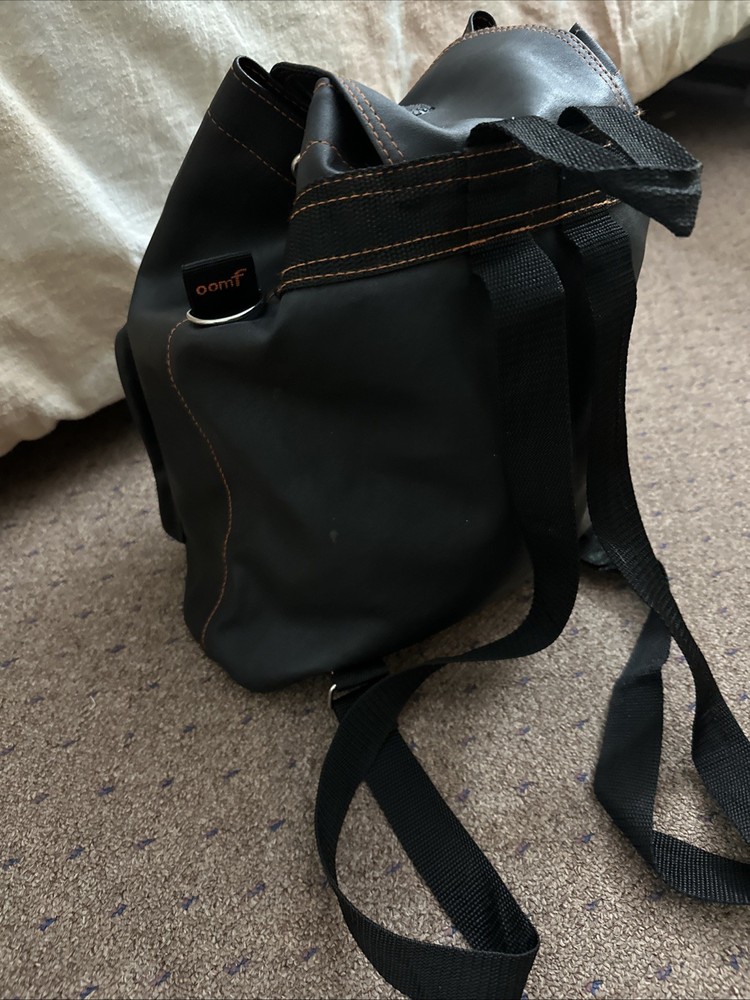 vintage-style black leather backpack