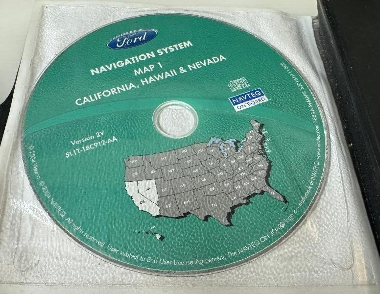FORD P/N 5L1T-18C912-AA NAVIGATION SYSTEM DISCS ((MISSING 8)) UNTESTED CONDITION