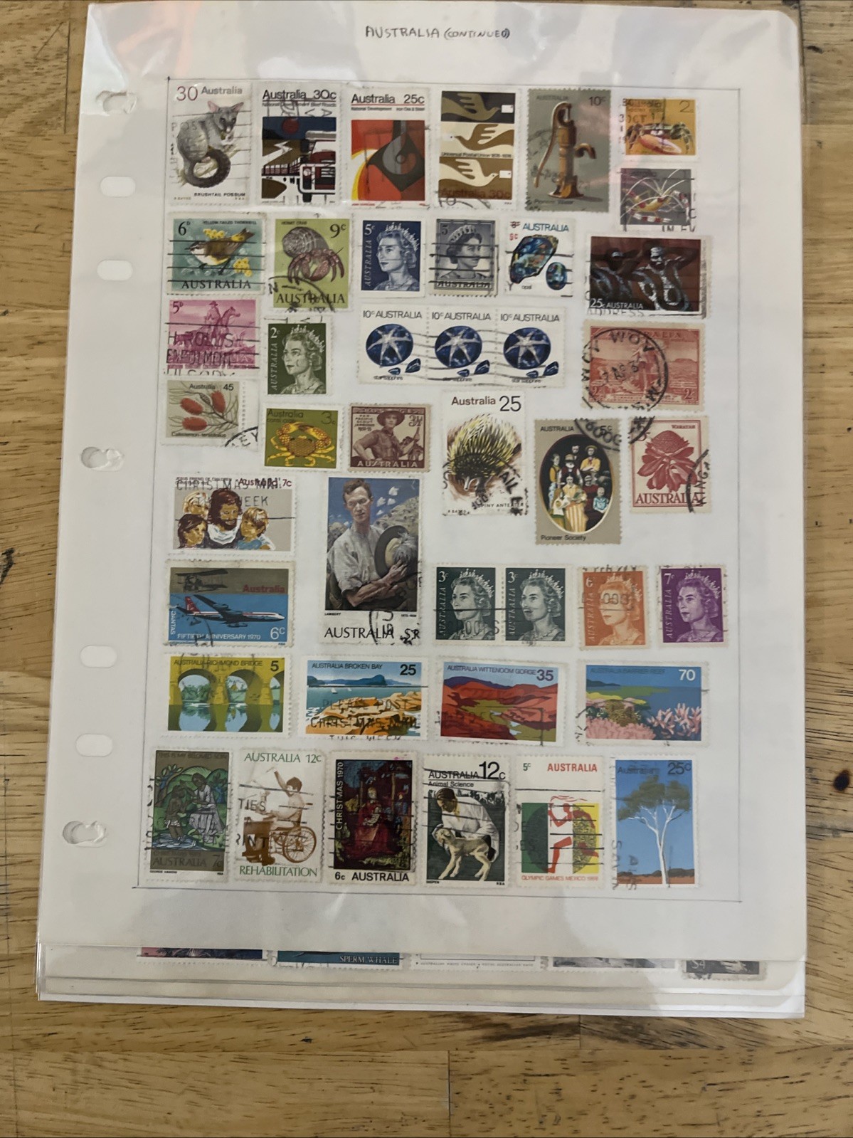Lot of new and used stamps from all over the world. ON Paper.