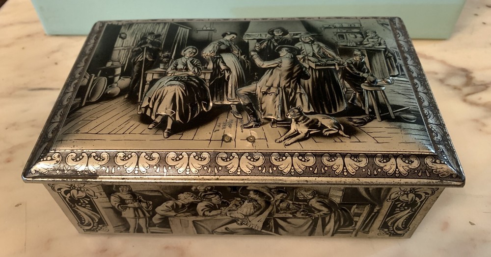 VINTAGE RUBENS EMBOSSED TIN BOX KEYLESS BOX
