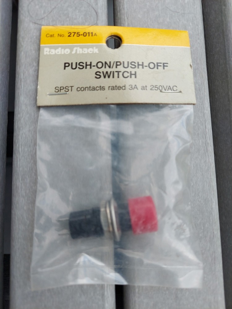 Push on push off switch SPST contacts rated 3A at 250 VAC