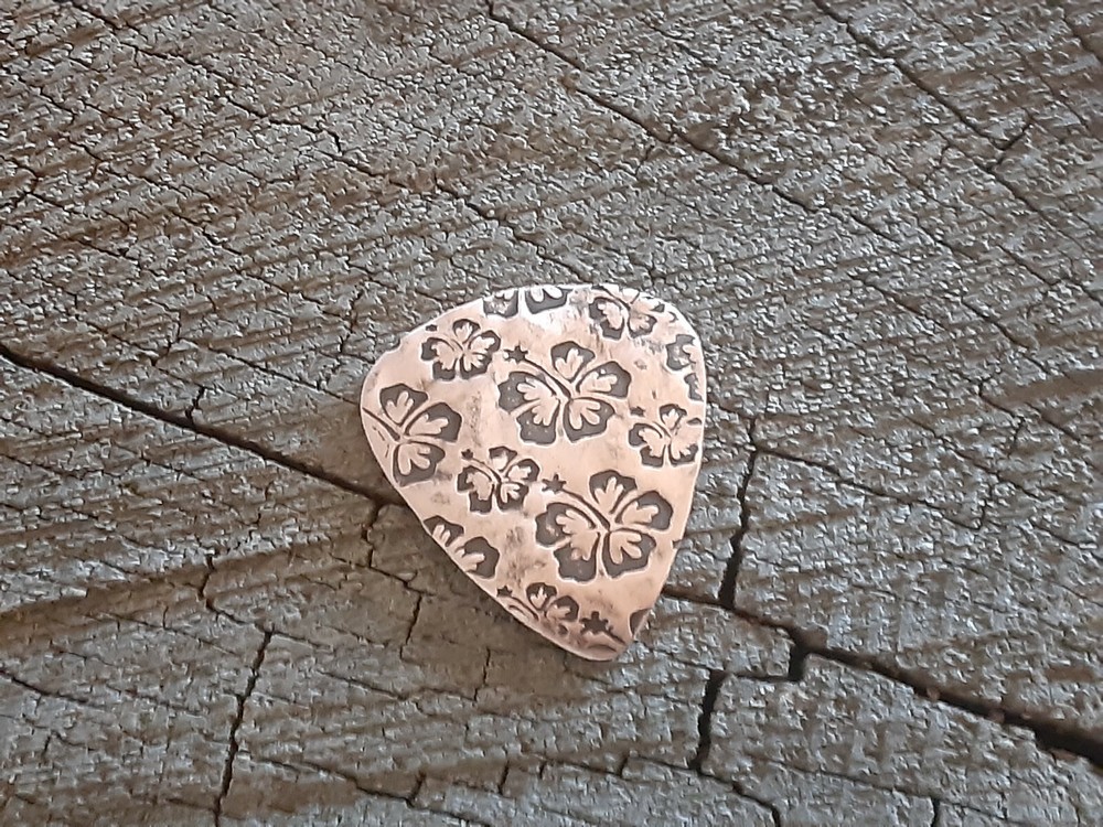 rustic copper guitar pick - playable and handmade - hibiscus