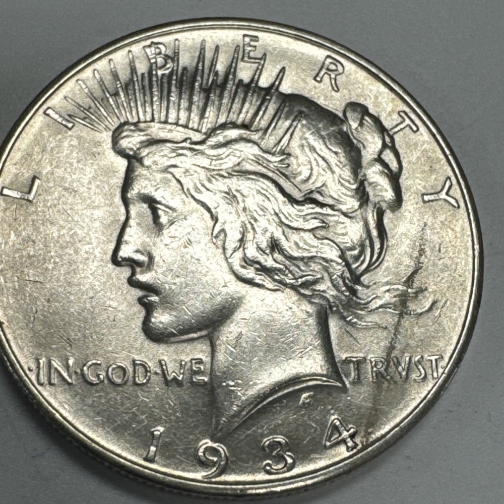 1934-D $1 Peace Silver Dollar AU.