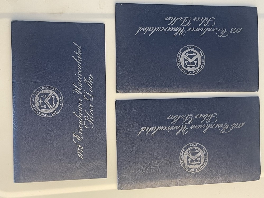 1972, 1973, 1974 Eisenhower 40% Silver Dollars Blue Envelopes, Uncirculated