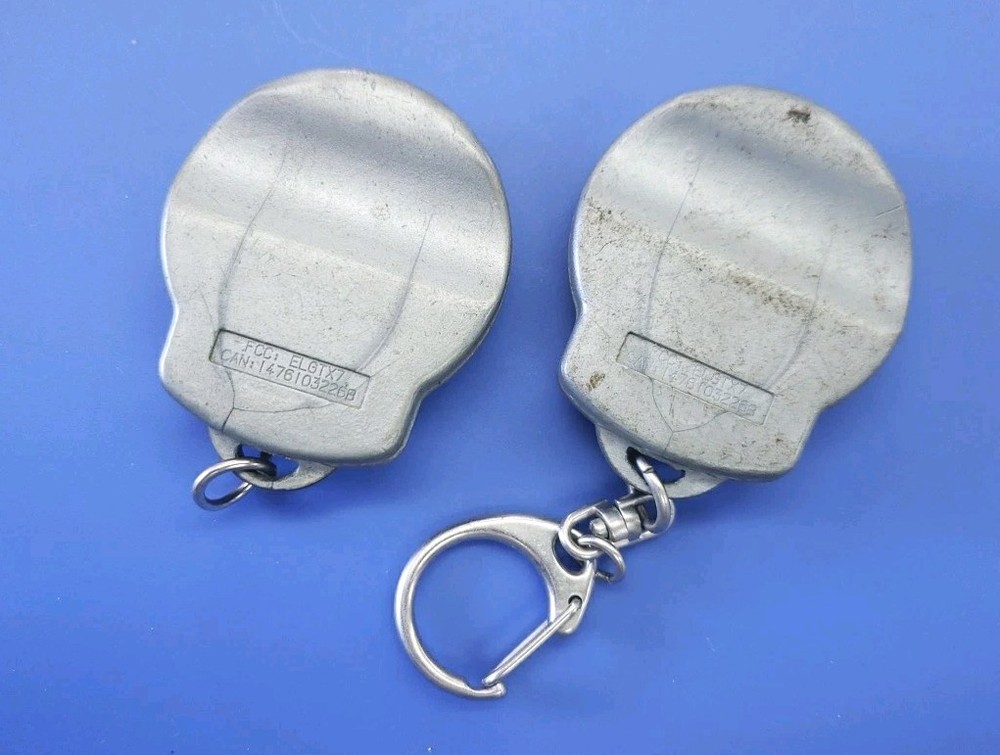 2x USED TESTED WORKING DesignTech ELGTX7 5-Button Remote Transmitter - SILVER