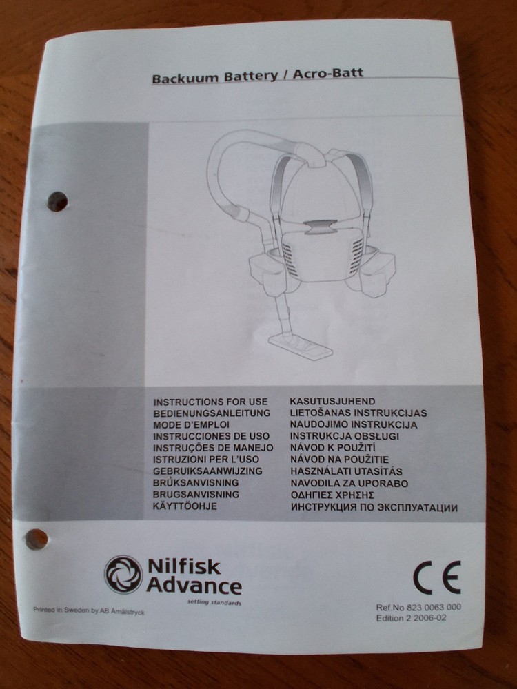 Nilfisk Advance Acro-Batt Battery powered Back Pac Vacuum. Operators / Instructi