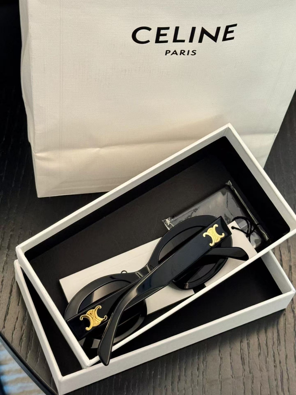 Celine CL40194U Triomphe Oval Sunglasses Black Frame Dark Grey Lens Women