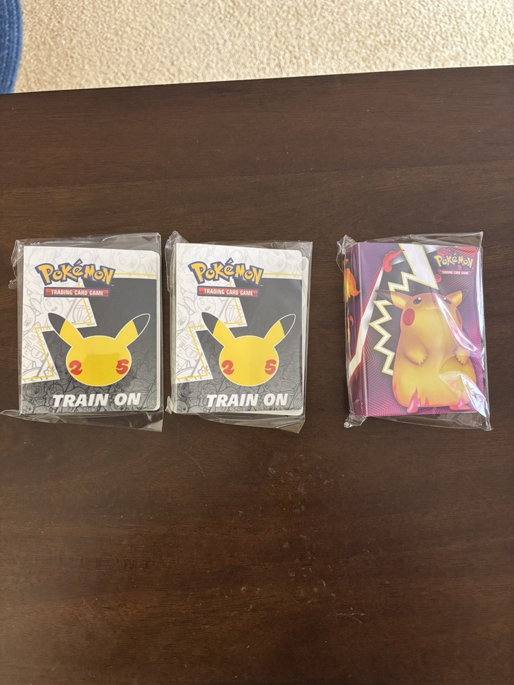 Pokemon Celebrating 25 Years Mini Binders -2 Plus Pikachu/charizard