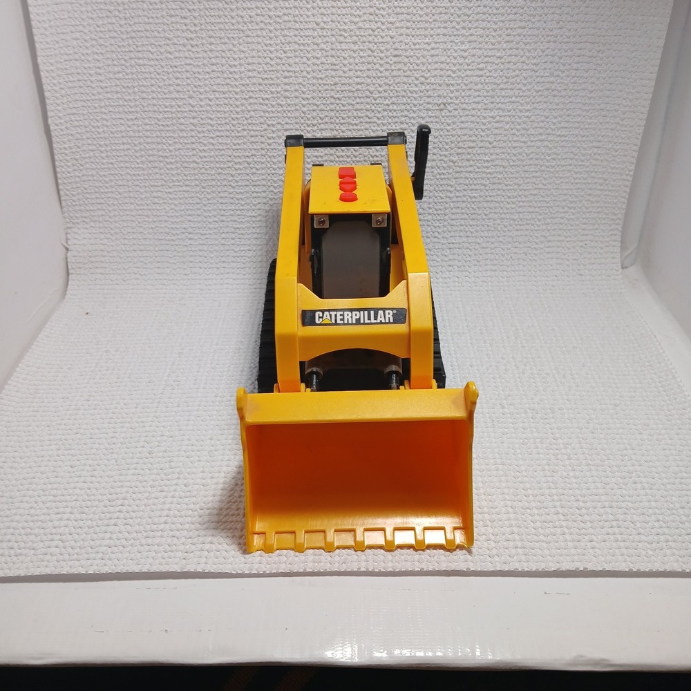 Caterpillar (CAT) toy skid steer loader, likely a "Big Builder". UNTESTED