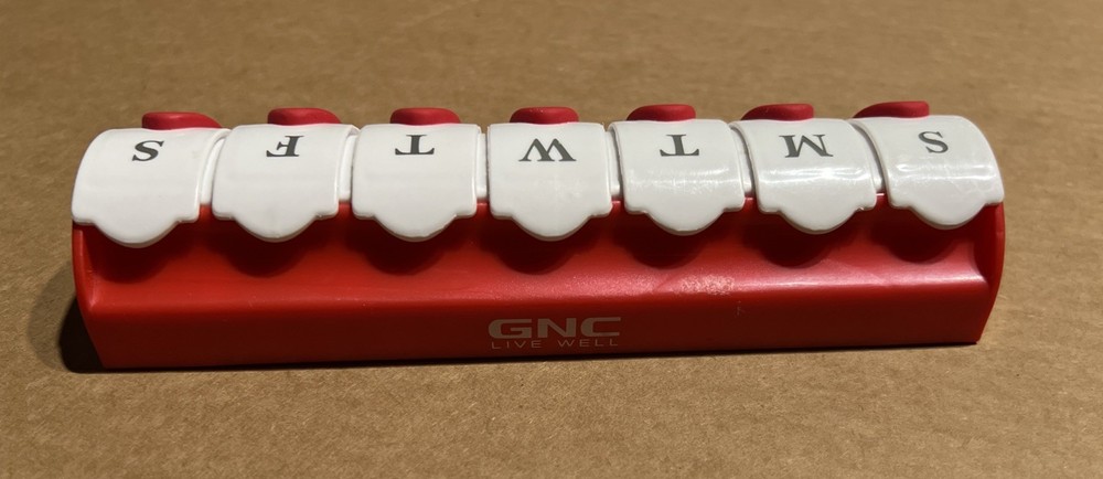 GNC 7 Day Pill Box - 7 Different Compartments - Plastic - Red/White