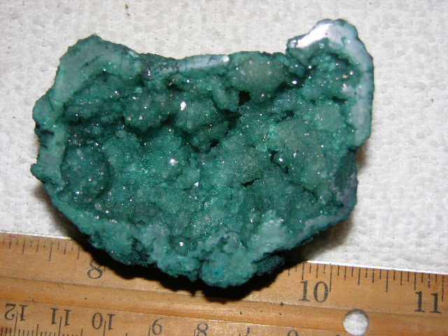 Geode cut & polished half with colored crystal center 3 inch E75