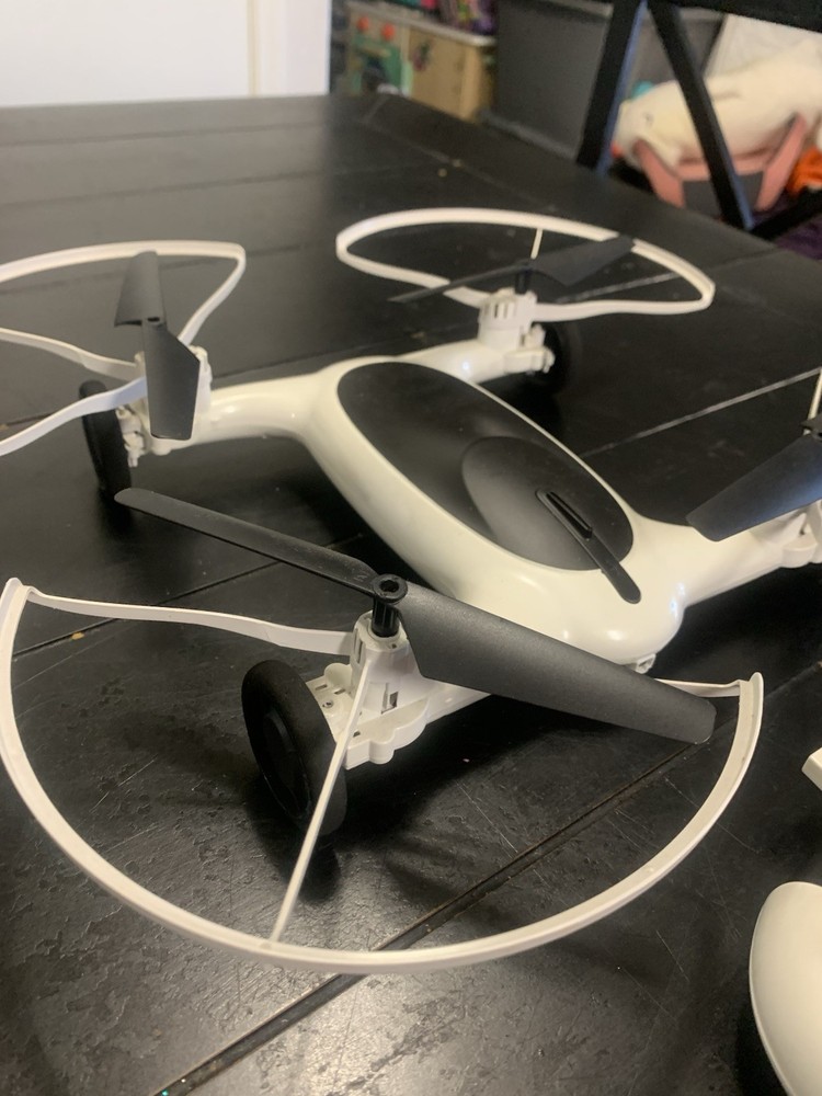 SHARPER IMAGE FLY + DRIVE 7" DRONE RECHARGEABLE DUAL FUNCTION 2.4GHZ LONG RANGE