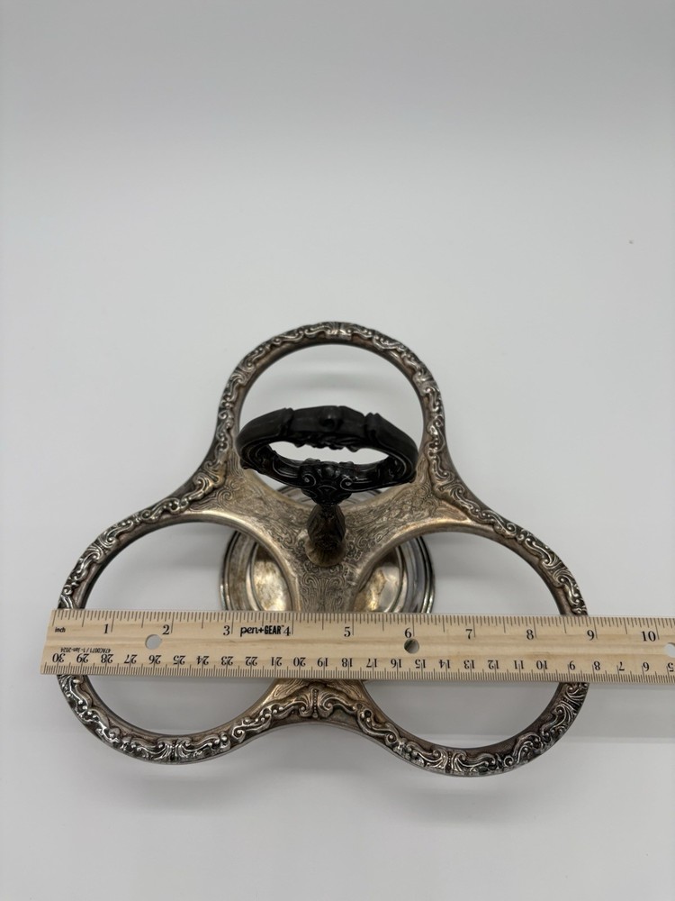 Vintage Sheridan silver-plated condiment caddy with ornate scrollwork