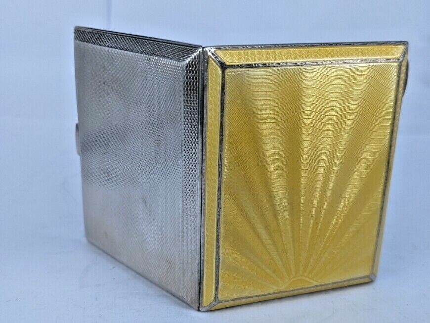 1932  high Art deco yellow guilloche sunburst pattern silver case