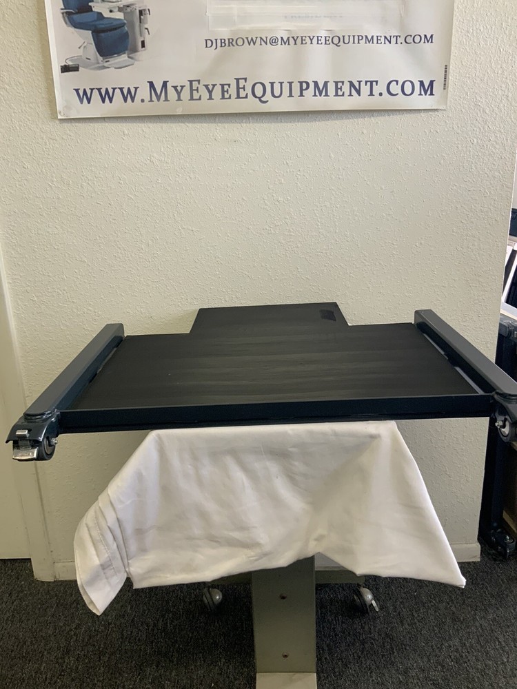 Ophthalmic Chair mover. TOPCON
