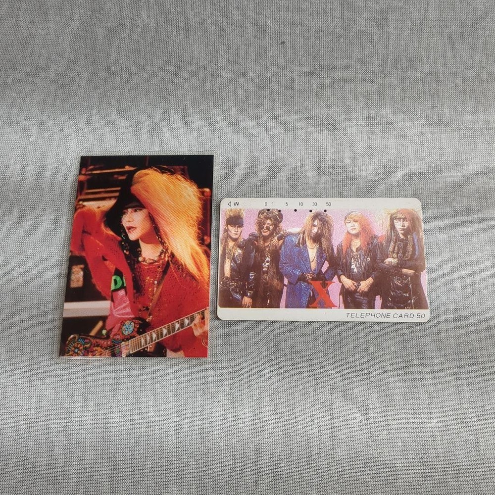 X Used telephone card hide card