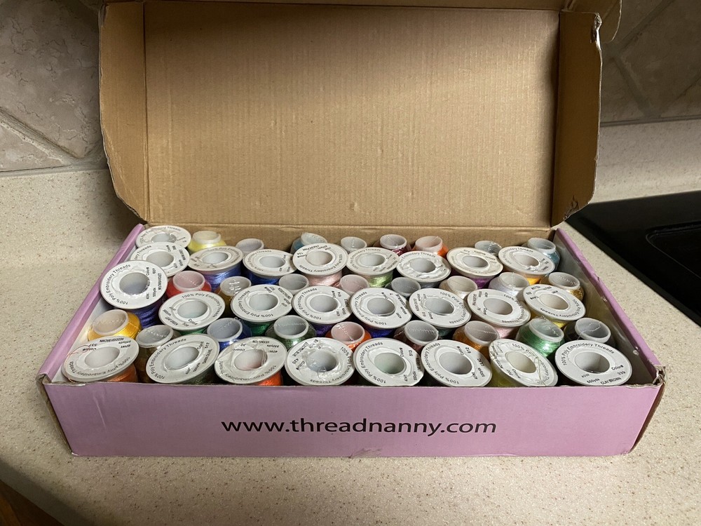 THREAD NANNY 50 CONES OF POLYESTER MACHINE EMBROIDERY THREAD 550YD