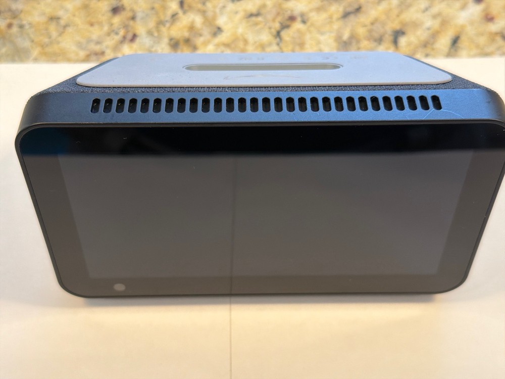 Amazon Echo 5 first generation with Amazon power supply. Excellent condition.