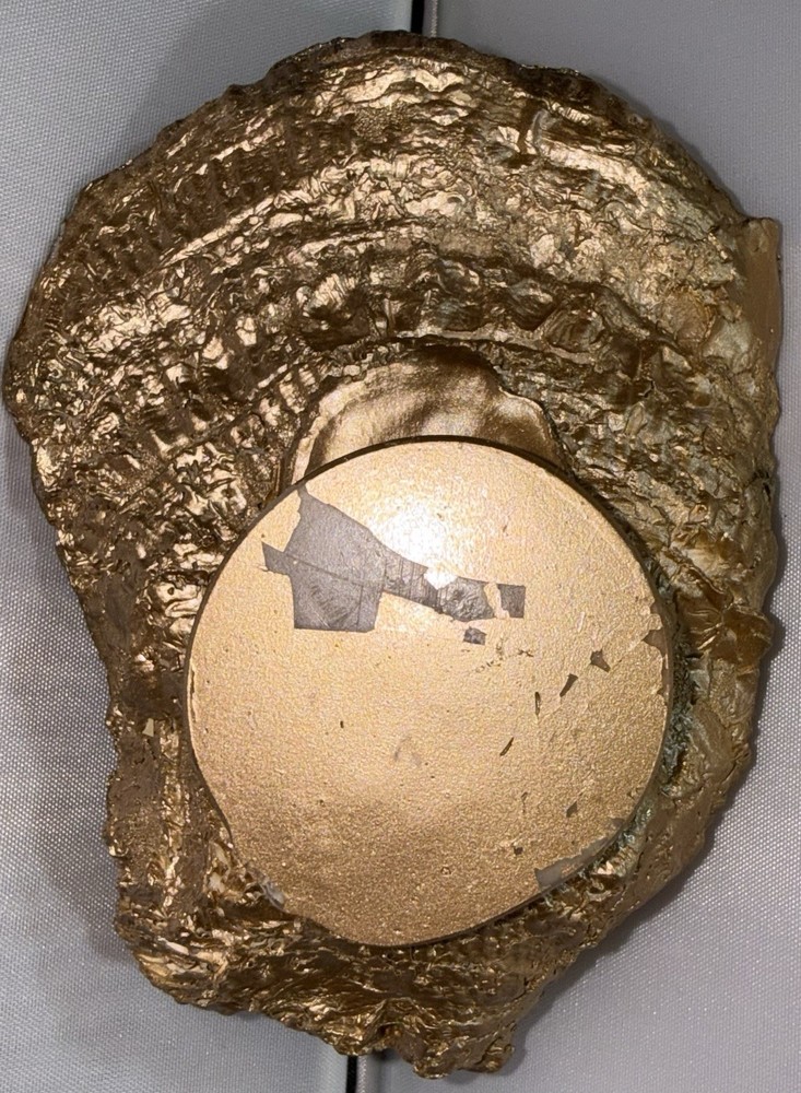 Decoupaged oyster shell ring dish featuring a Buddha image with gold-leaf edging