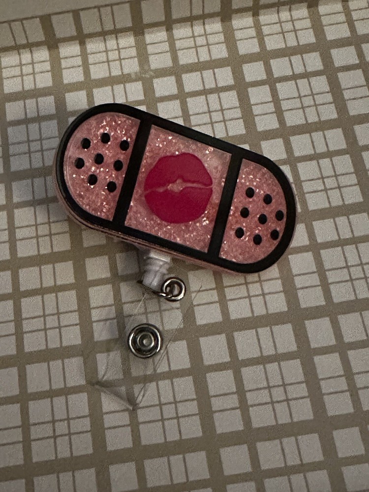 Lip Glitter Bandage badge reel