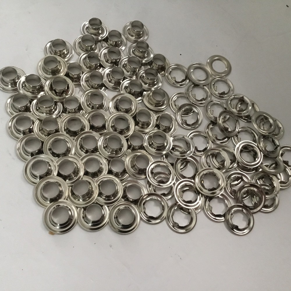 Grommets nickel , sets. size 4.