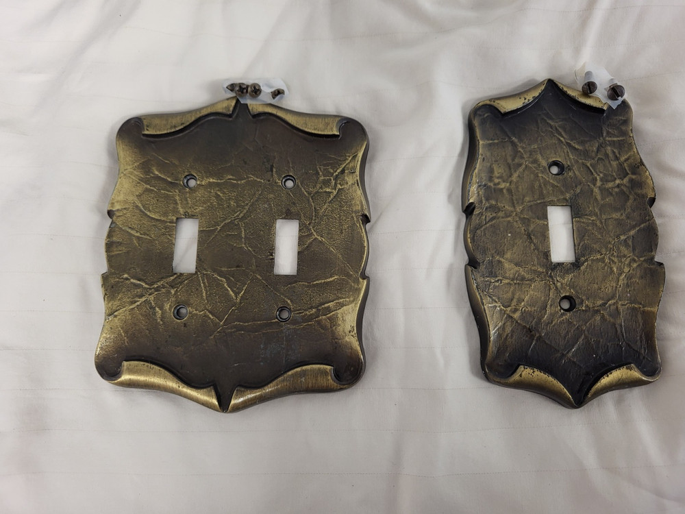 Vintage brass light switch covers