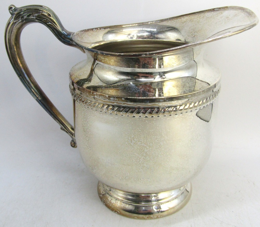 English Silver MFG Corp, 8" Wide Spout Water Pitcher.
