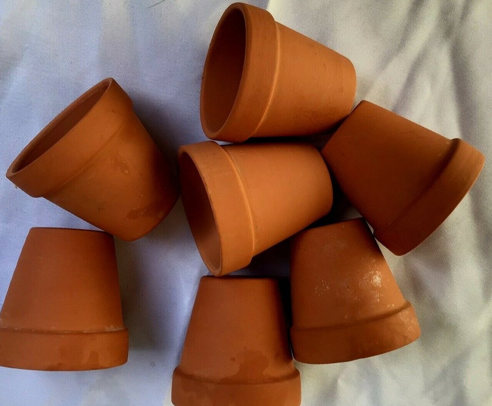 7 Never Used 2.5"  high Clay Pots