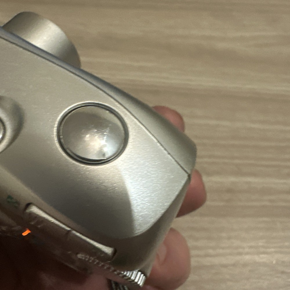 Olympus FE-100 4.0MP Compact Digital Camera Silver read description