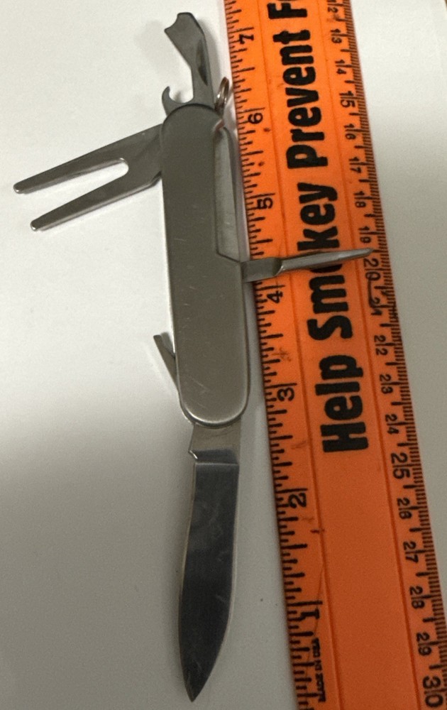 Four function golf knive