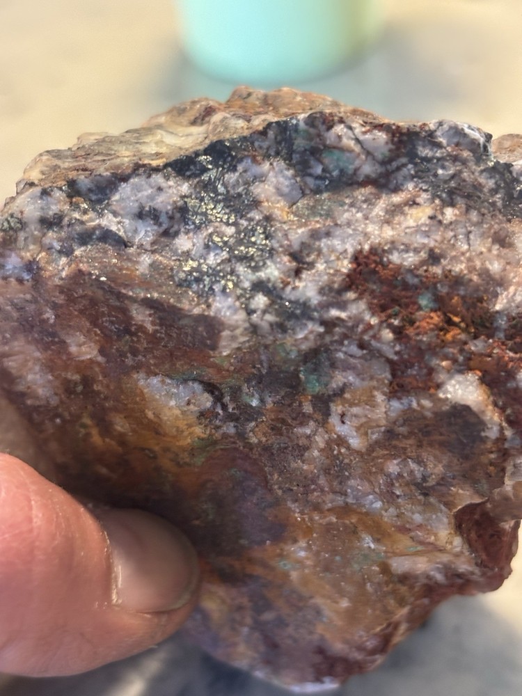 highly mineralized gold ore on quartz