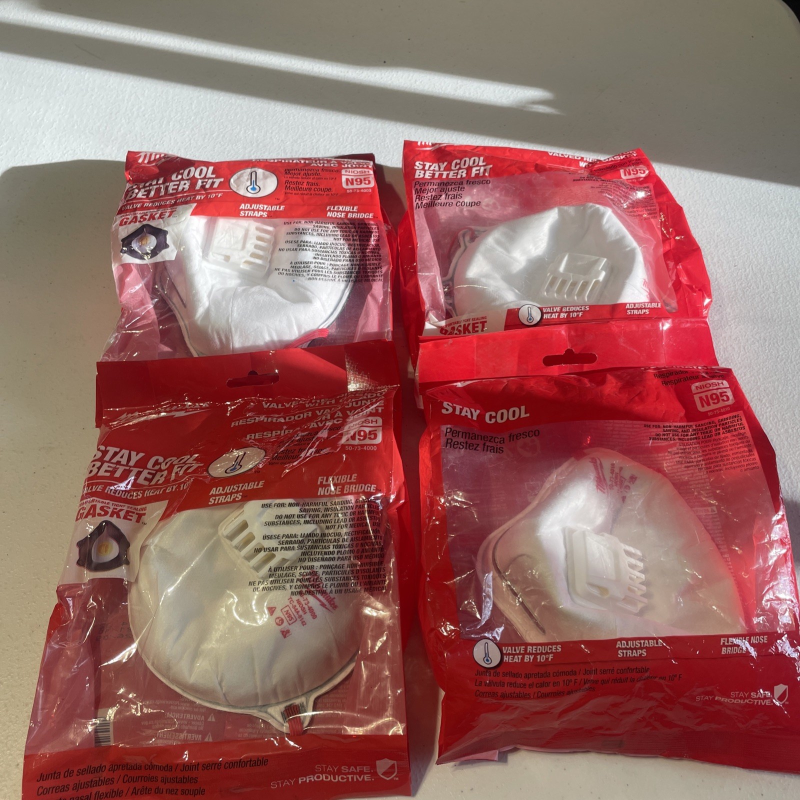 4 NEW MILWAUKEE VALVED RESPIRATOR MASKS W/ GASKETS  # 48-73-4001