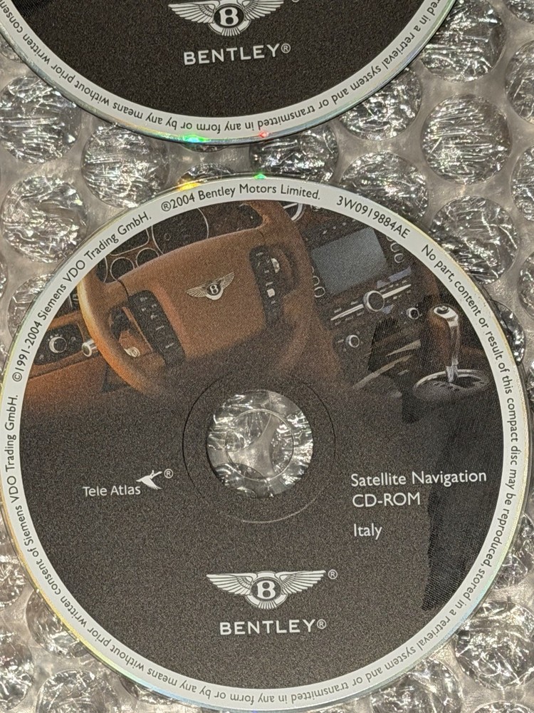 2004 Bentley Continental GT 7 Navigation Disc Set & Bentley Disc Case.