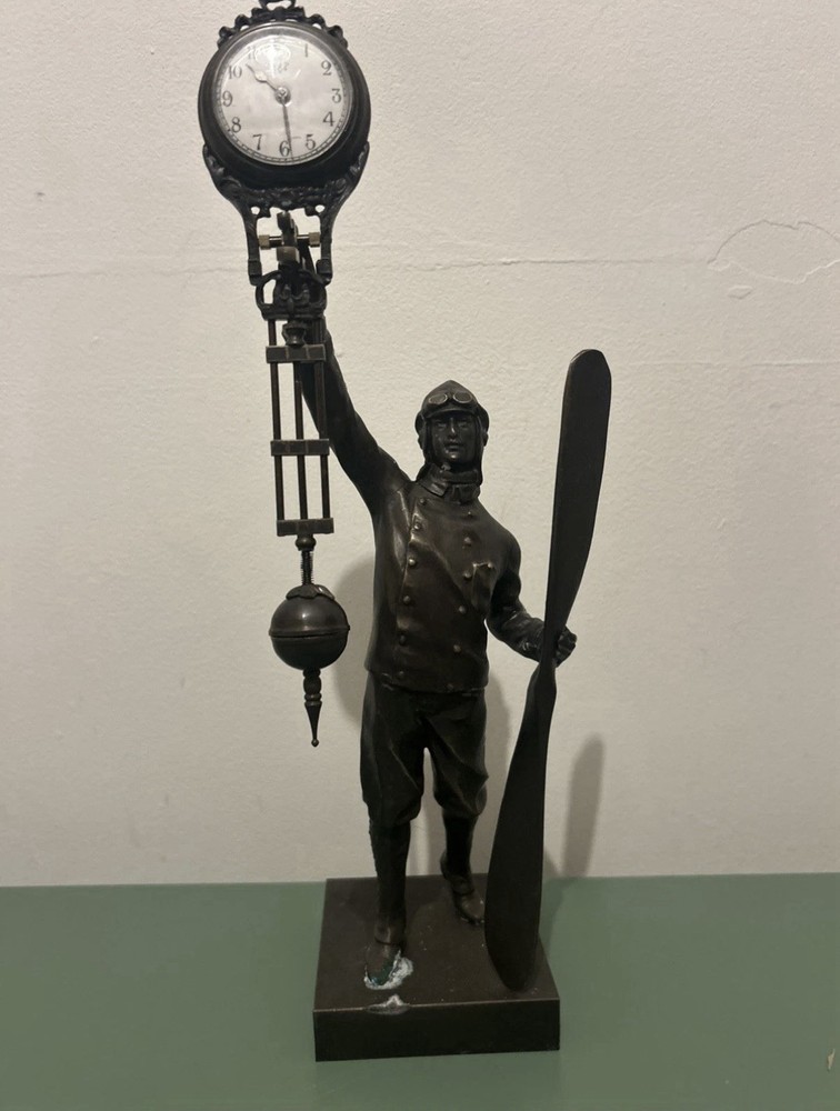 Vintage Bronze Junghans Pilot FigureSwinging Mystery Clock