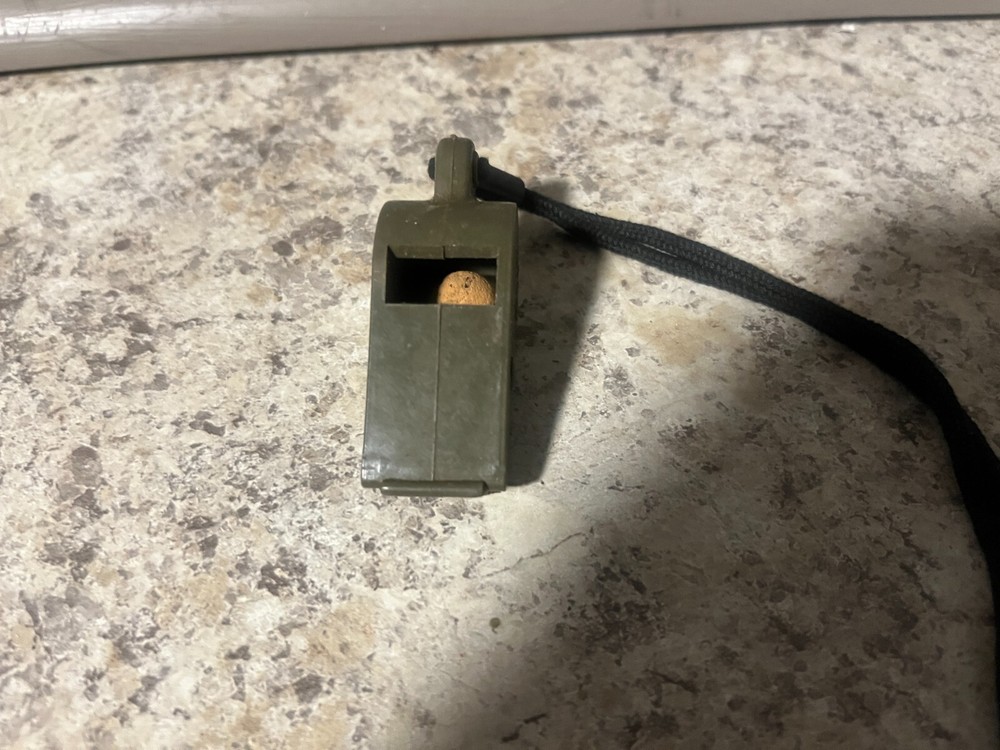 Vintage WW2 U.S. Navy 1944 dated OD Plastic Whistle with Black Lanyard Works!