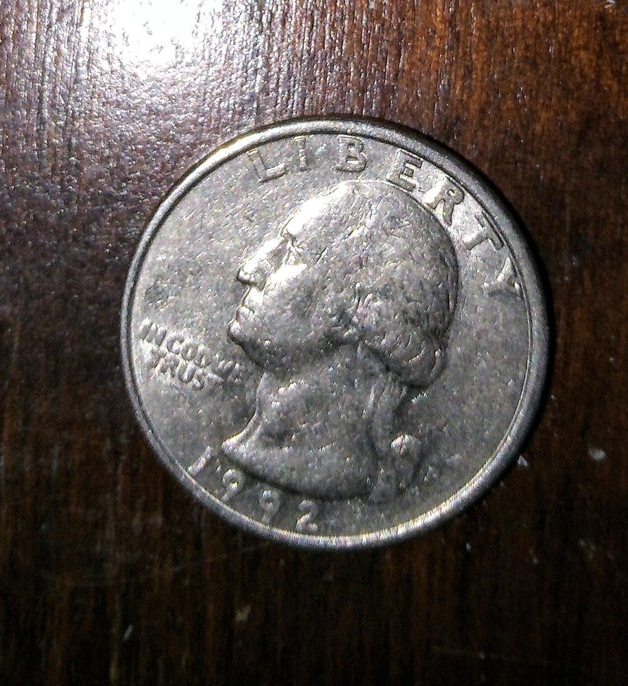 1992 P mint mark quarter with In Cod We Trust error