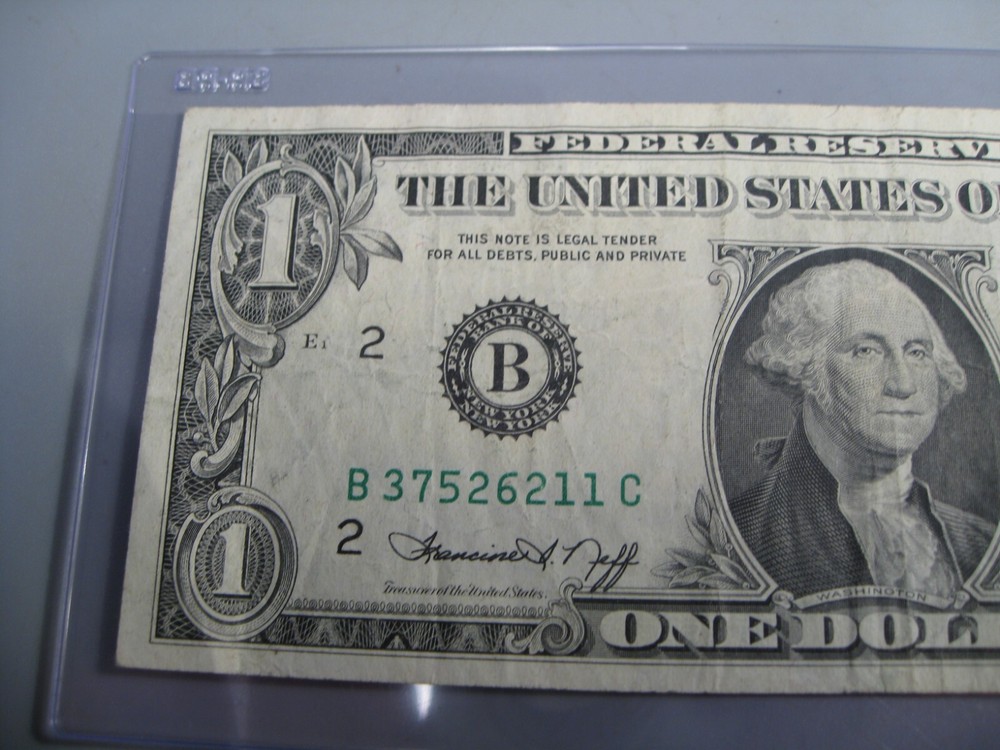 ERROR Note: INK SMEAR. 1974 $1 One Dollar FRN Note. B/C Block.