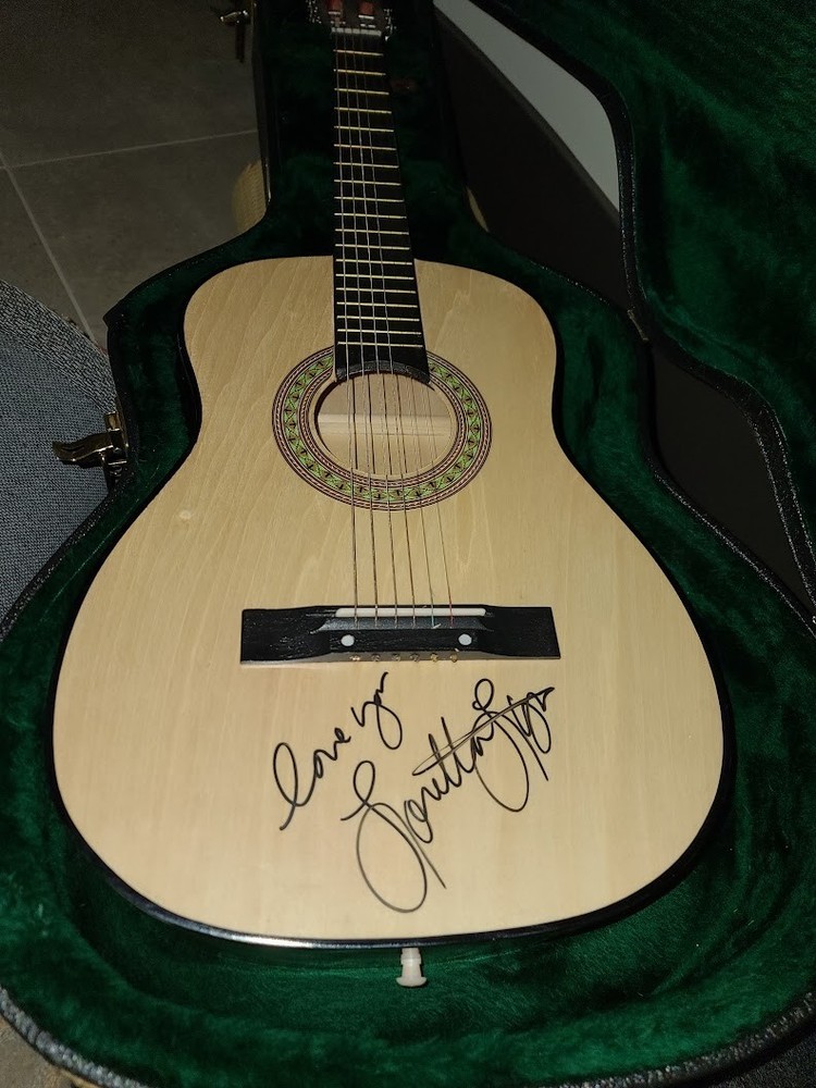 Guitar signed by Loretta Lynn