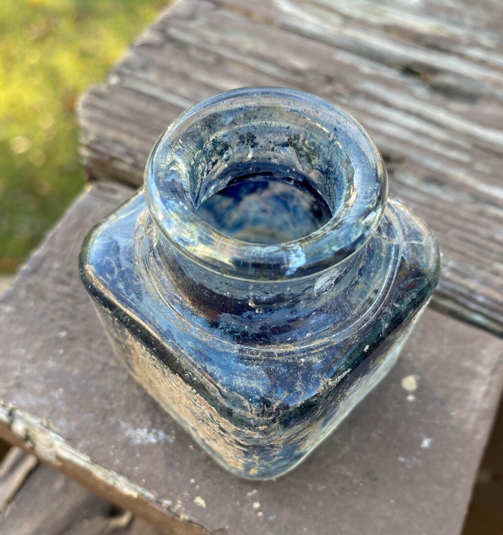 Clear Inkwell With Blue Ink And Partial Label
