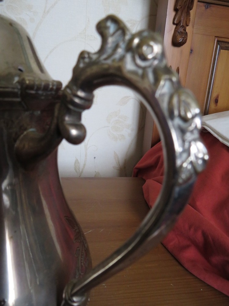 Vintage silver plated ornate coffee pot