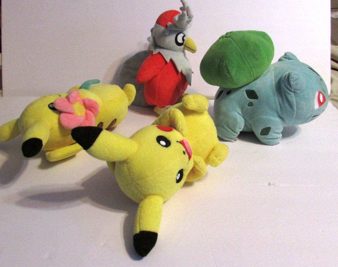 Lot Of 4 Pokemon Plush Pikachu W/Flower Delibird Bulbasaur